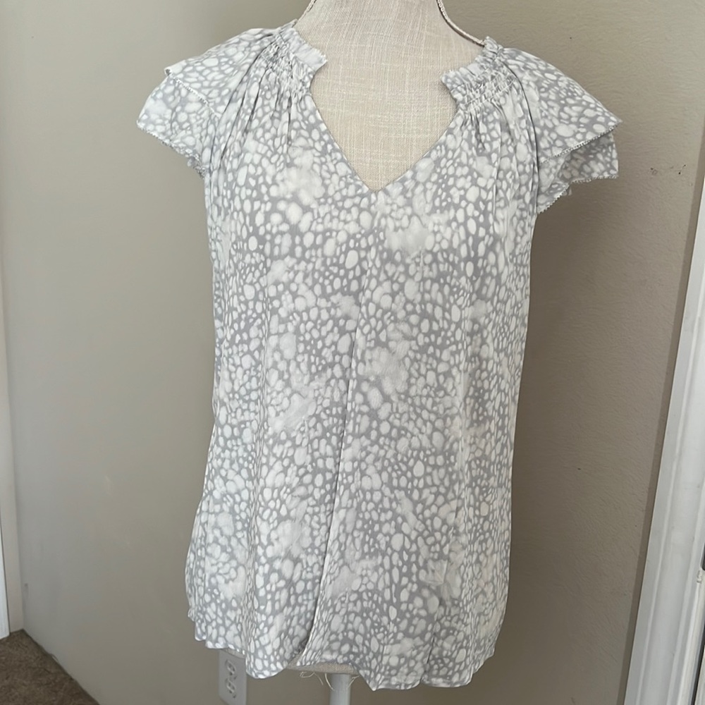 A New Day medium white dot top with the cutest detail on the shoulders!